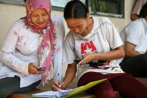 Village Phone Operators recording transactions manually